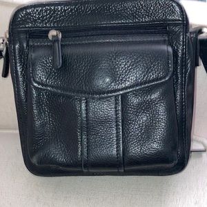 Small black leather crossbody style purse. Fossil brand. Used/like new